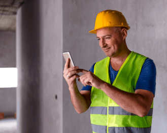 Contractor on his phone