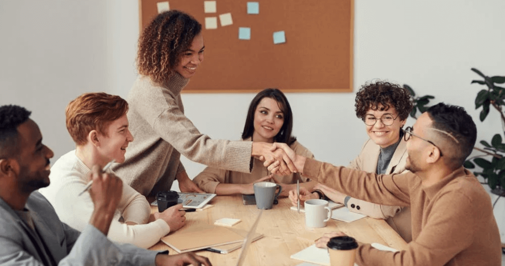 happy employees in a meeting within a smart building